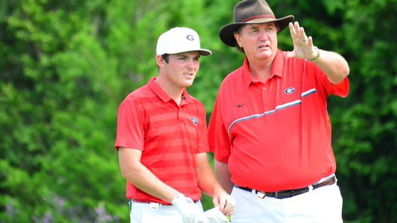 Georgia's Trent Phillips and coach Chris Haack discuss strategy during the NCAA Championships at Blessings Golf Club in Fayetteville, Ark., on Sunday, May 26, 2019. (Photo by Steven Colquitt/UGA Athletics)