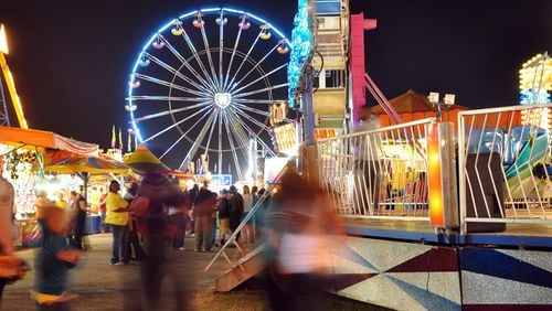 Alpharetta will allow a carnival to set up for 16 days — 12 days longer than ordinarily permitted — in the parking lot of North Point Mall. AJC FILE