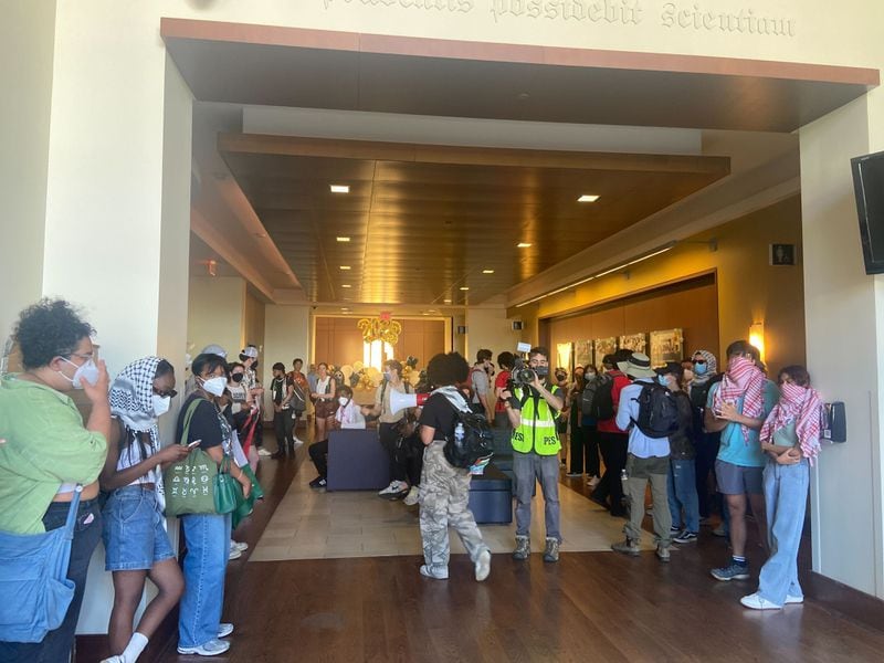 Protesters entered an administration building at Emory University on Wednesday, filling the lobby of the Oxford Road Building for a short time. Emory police asked them to leave due to the building having had closed just minutes prior. Protesters peacefully exited the building and continued protesting outside.