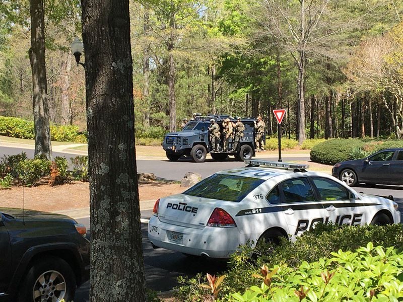 Two people believed to be suspects in a double homicide were taken to a local hospital after a SWAT standoff. (Credit: Channel 2 Action News)
