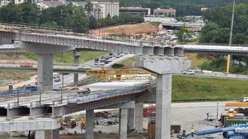 August 9 2019 Sandy Springs/Atlanta - Picture shows construction site of I-285 interchange at Ga. 400 in Sandy Springs on Friday, August 8, 2019. I-285 is showed in middle (horizontal) and Ga. 400 northbound is shown in diagonal (south to north). Construction is peaking on one of the biggest road projects in Georgia history, and motorists are enduring the hassles that come with it. The new $800 million I-285 interchange at Ga. 400 in Sandy Springs will be bigger than Spaghetti Junction, and the scale of the work is becoming visible as new rise ramps above the existing interchange. When it's completed, it will ease traffic at one of the busiest stretches of highway in the Southeast and serve as a linchpin for metro Atlanta's growing network of toll lanes. In the meantime, commuters must navigate a constant maze of lane and road closures, detours and congestion. (Hyosub Shin / Hyosub.Shin@ajc.com)