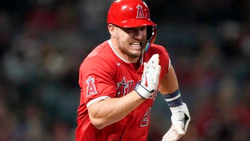 Los Angeles Angels' Mike Trout runs after a single during the seventh inning of a baseball game against the Philadelphia Phillies, Monday, April 29, 2024, in Anaheim, Calif. (AP Photo/Ryan Sun)
