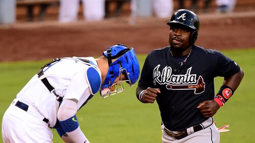 Brandon Phillips  switched from second base to third base and was inserted in the lineup Wednesday against the Dodgers after one pregame workout at the new position. His only previous professional game at third base was for the Expos’ Double-A  affiliate in 2001. (Photo by Harry How/Getty Images)