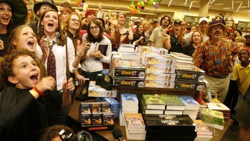In this 2007 photo, Harry Potter fans cheered as “Harry Potter and the Deathly Hallows” was unveiled at the Barnes & Noble Buckhead in Atlanta. The celebrations are starting up again as the book series turns 20.