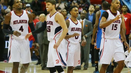 The Hawks are deciding whether to keep their core of (from left) Paul Millsap, Kyle Korver, Jeff Teague and Al Horford together for one more playoff run. (Curtis Compton / ccompton@ajc.com)