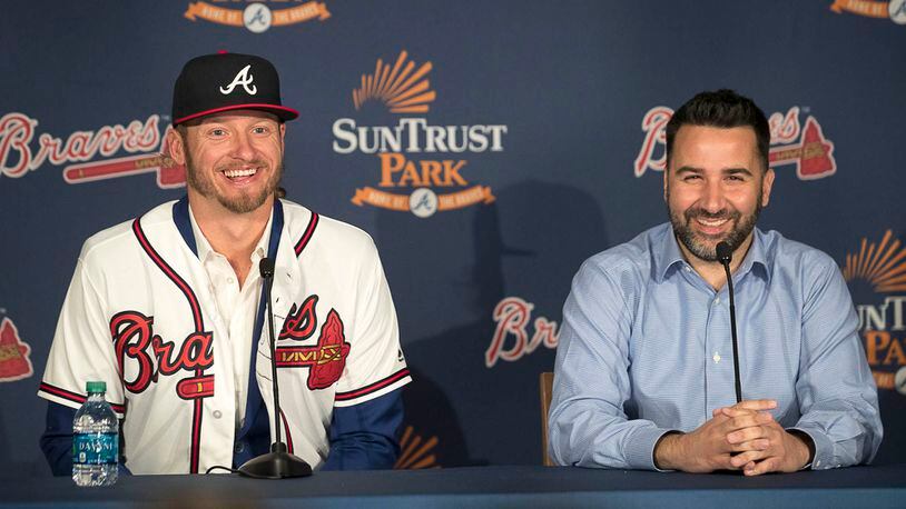 Josh Donaldson (left) and Braves General Manager Alex Anthopoulo (right) share a laugh during a press conference Tuesday, Nov. 27, 2018, at the Delta Sky 360 Club at SunTrust Park in Atlanta.