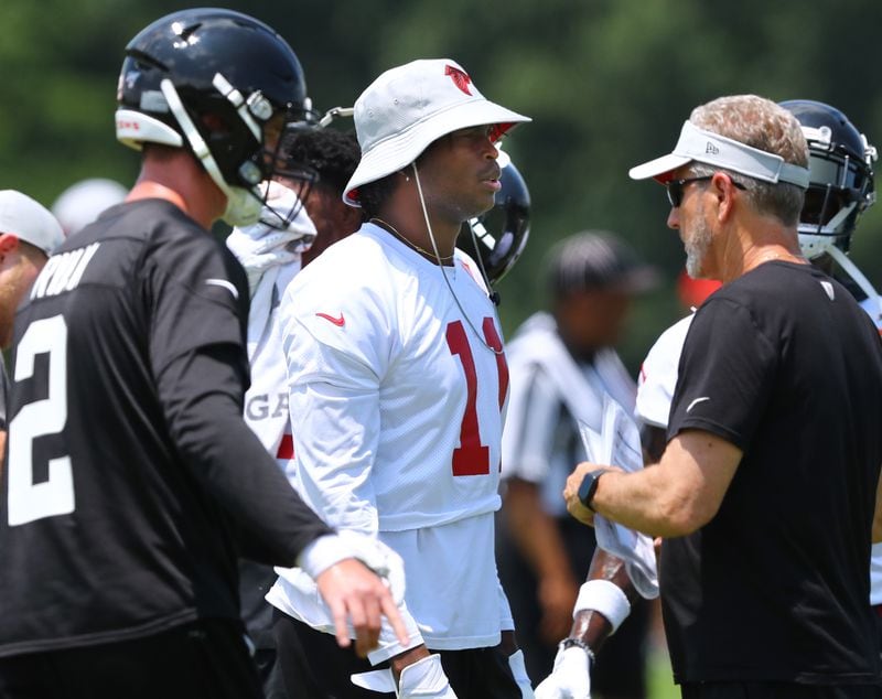Falcons quarterback Matt Ryan, wide receiver Julio Jones, and offensive coordinator Dirk Koetter get in some work on the opening day of minicamp on Tuesday, June 11, 2019, in Flowery Branch.  Curtis Compton/ccompton@ajc.com