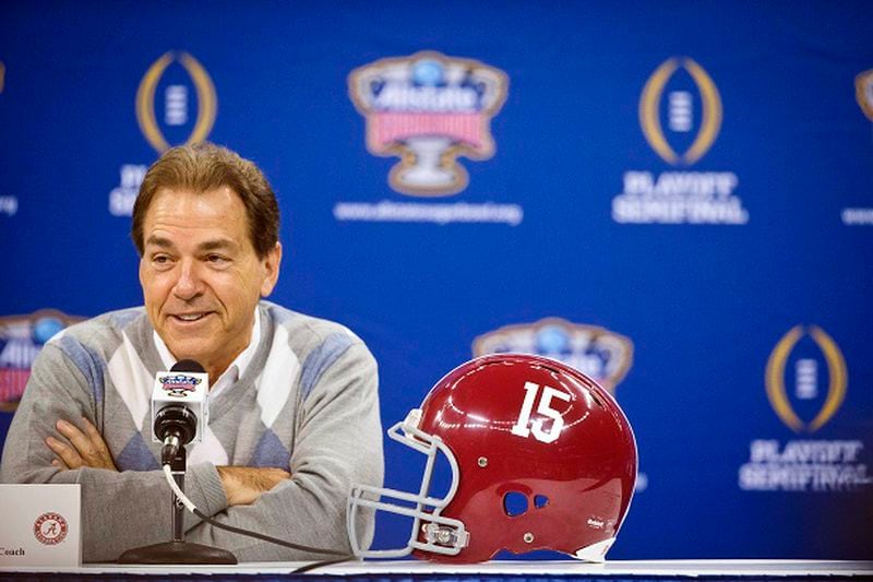 Alabama head coach Nick Saban laughs at a question during media day for the Sugar Bowl NCAA college football game at the Mercedes-Benz Superdome in New Orleans, Tuesday, Dec. 30, 2014. Alabama is slated to square off against Ohio State on New Year's Day. (AP Photo/Brynn Anderson) Flashing his annual smile. (Brynn Anderson/AP photo)