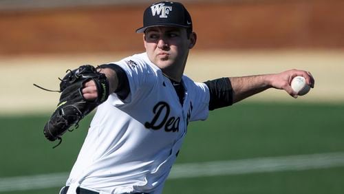 In this Feb. 15, 2020, file photo, Wake Forest's Jared Shuster pitches during an NCAA baseball game in Winston-Salem, N.C. Shuster was selected by the Atlanta Braves in the baseball draft Wednesday, June 10, 2020. (AP Photo/Ben McKeown, File)