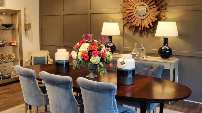 Vignettes like this dining room in Nandina help shoppers visualize how furniture, fabric, lighting and carefully placed accessories work together. Contributed by Nandina