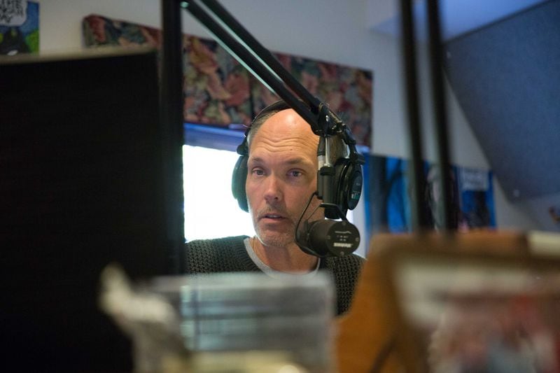Ron Michaels, who is Moby's producer, talks on air during the last few minutes of Moby's last show, Friday, Dec. 30, 2016, in Roswell, Ga. Moby is retiring after a career of almost 50 years in radio. BRANDEN CAMP/SPECIAL