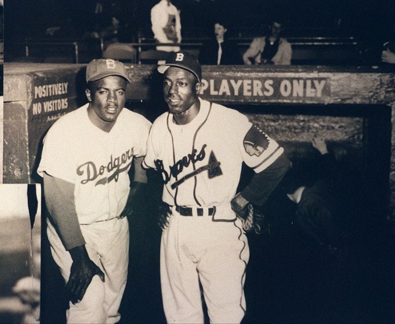 970611 - Copy of photo from the Braves Museum at Turner Field ( l to r) of Jackie Robinson with Sam 'Jet' Jethro, the first African-American to play for the Braves, joining the team in 1950. (AJC Staff Photo/Taimy Alvarez)