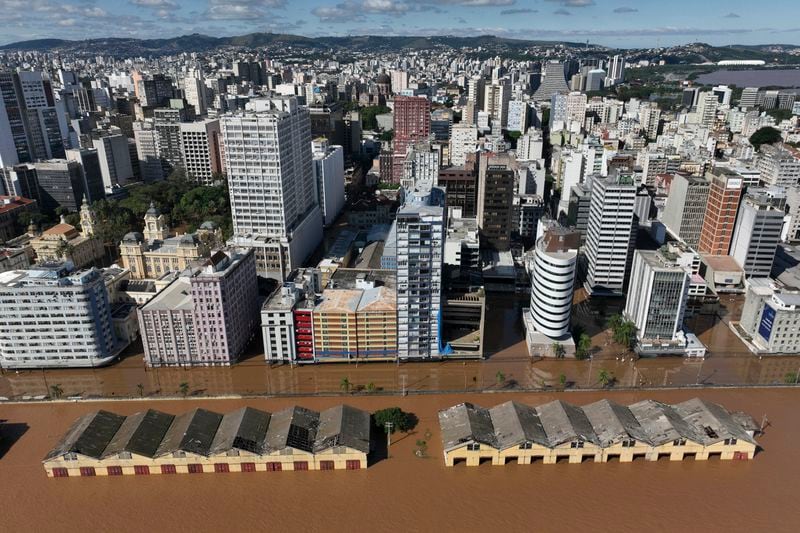 The area near the Guaiba River is flooded after heavy rain in Porto Alegre, Rio Grande do Sul state, Brazil, Thursday, May 9, 2024. (AP Photo/Andre Penner)