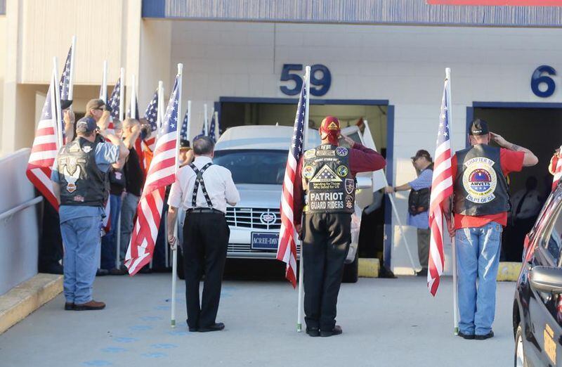 The remains of Korea War vet Cpl. Terrell J. Fuller, who went missing 67 years ago, arrived at the airport Thursday morning and was escorted to his hometown of Toccoa, where residents gathered for a hero's welcome. Bob Andres / bandres@ajc.com