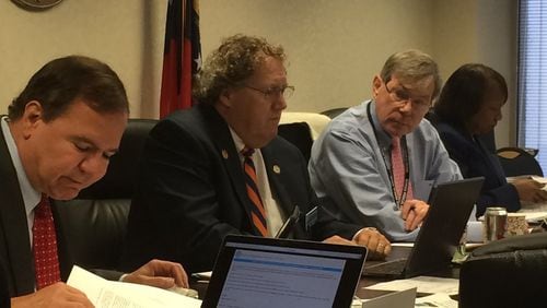 A new bill, expected to be passed into law by Gov. Brian Kemp, will require the Georgia Medical Composite Board to report how many physicians have been the subject of sexual misconduct investigations, including assault, abuse and exploitation. Pictured last year (from left) are board members Dr. John Antalis, Dr. John Jeffrey Marshall, and Dr. E. Dan DeLoach, and interim executive director LaSharn Hughes. (AJC file)