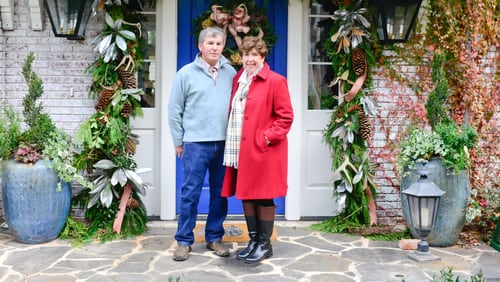 Tom and Kathy Hogan Trocheck, who moved into their third Avondale Estates home in 2014, recently spruced up the front door with holiday garland and new paint — Delft by Sherwin-Williams. Kathy is a New York Times bestselling author who writes under the pen name Mary Kay Andrews, and Tom is an industrial development consultant. Text by Lori Johnston and Shannon Adams/Fast Copy News Service.(Christopher Oquendo Photography/www,photography.com)