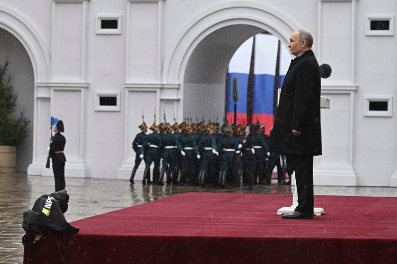 Russian President Vladimir Putin reviews honour guards of the Presidential regiment following his inauguration ceremony at the Kremlin in Moscow, Russia, Tuesday, May 7, 2024. Putin began his fifth term Tuesday as Russian leader at a glittering Kremlin inauguration, setting out on another six years in office after destroying his political opponents, launching a devastating war in Ukraine and concentrating all power in his hands. (Pavel Bednyakov, Sputnik, Kremlin Pool Photo via AP)