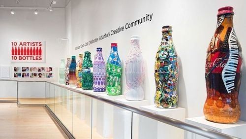 From AJC story: http://www.myajc.com/blog/talk-town/atlanta-artists-put-their-spin-coca-cola-bottles/mDAZuaU4JumQ2HOdsoQVrM/