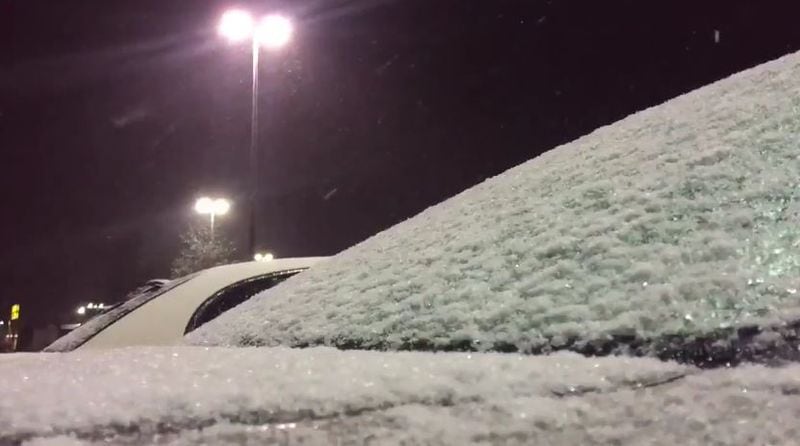 Snow appearing on cars in Acworth. (Credit:  Channel 2 Action News)