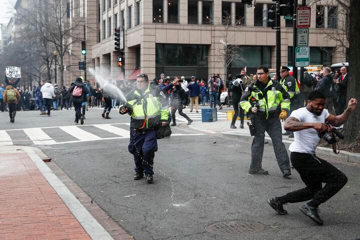 Activists, police clash on Donald Trump’s inauguration day
