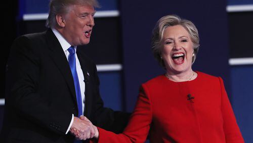 Donald Trump and Hillary Clinton shake hands after the first presidential debate. (Photo by Spencer Platt/Getty Images)