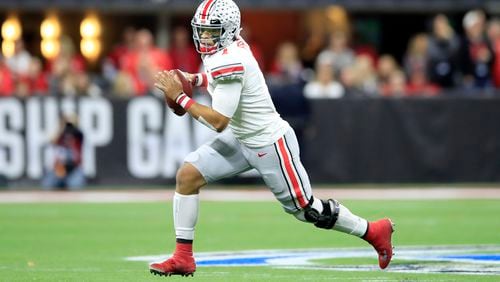 INDIANAPOLIS, INDIANA - DECEMBER 07: Justin Fields #1 of the Ohio State Buckeyes runs with the ball in the BIG Ten Football Championship Game against the Wisconsin Badgers at Lucas Oil Stadium on December 07, 2019 in Indianapolis, Indiana. (Photo by Andy Lyons/Getty Images)