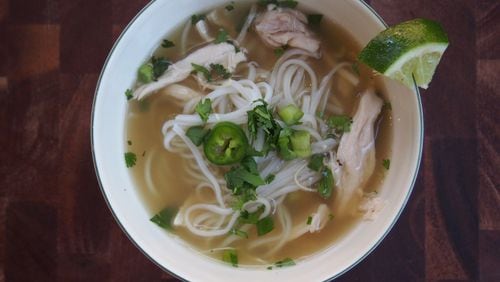 Rice noodles, peppery ginger and citrusy lemongrass transform chicken noodle soup into flavor-packed pho ga. CONTRIBUTED BY KELLIE HYNES
