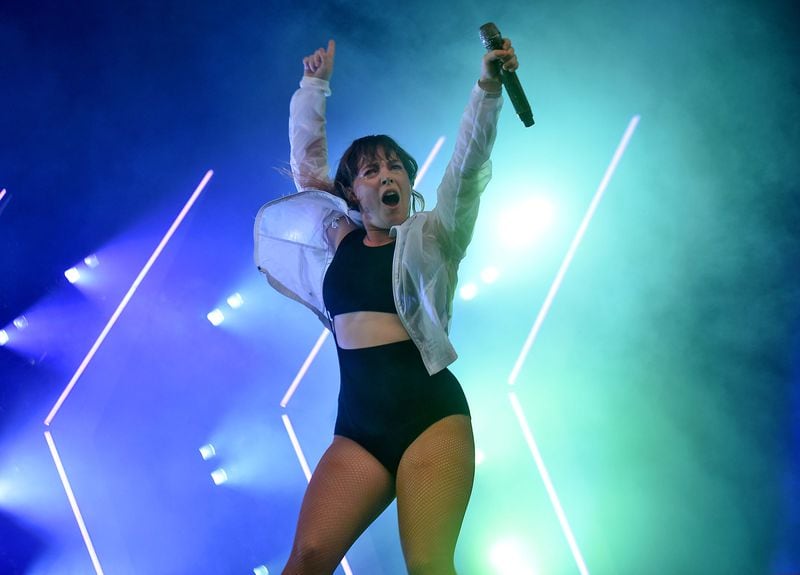 Amelia Meath, of the band Sylvan Esso, performs Sunday at Music Midtown. The two-day event also featured headliners Kendrick Lamar and Imagine Dragons. RYON HORNE/RHORNE@AJC.COM