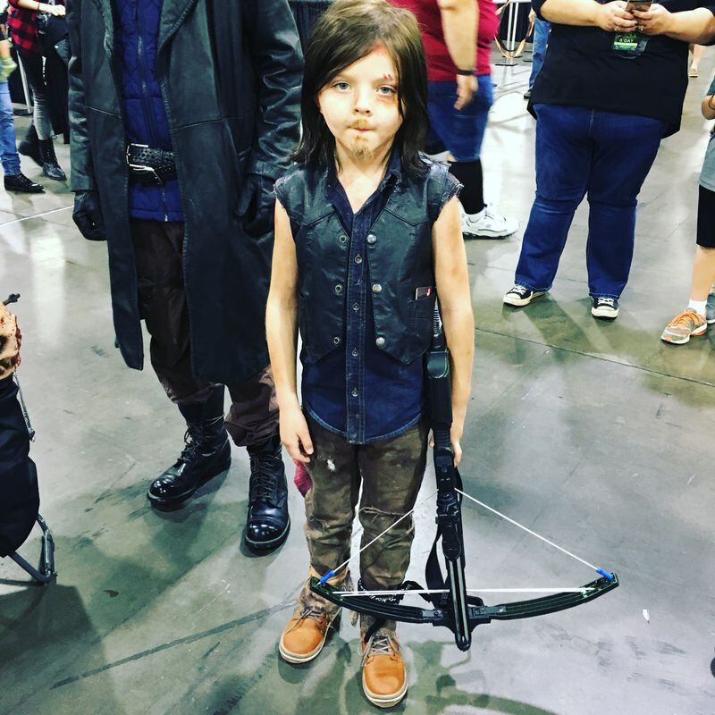 This eight year old is known as "Pintsize Daryl." His real name: Aden. You can find him on Twitter and Instagram @pintsizeddaryl