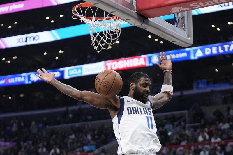Dallas Mavericks guard Kyrie Irving dunks during the second half in Game 2 of an NBA basketball first-round playoff series against the Los Angeles Clippers Tuesday, April 23, 2024, in Los Angeles. (AP Photo/Mark J. Terrill)
