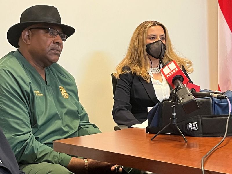 Douglas County Sheriff Tim Pounds and District Attorney Dalia Racine attend a news conference Wednesday regarding the death of 14-year-old Kyra Scott.