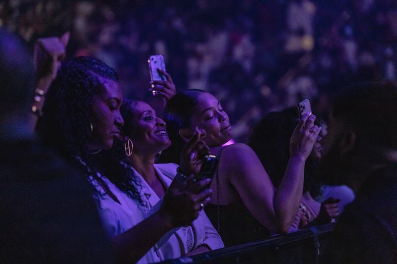 Fans listen to performances Friday, March 22, 2024, at Frankie Beverly & Maze's final Atlanta show at State Farm Arena. Opening acts included El DeBarge and Chaka Khan.  (Kymani Culmer for the Atlanta Journal-Constitution)