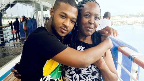Linda Falayi, shown on a 2015 trip to the Bahamas with her grandson, died Monday night when she was hit by a car in DeKalb County.