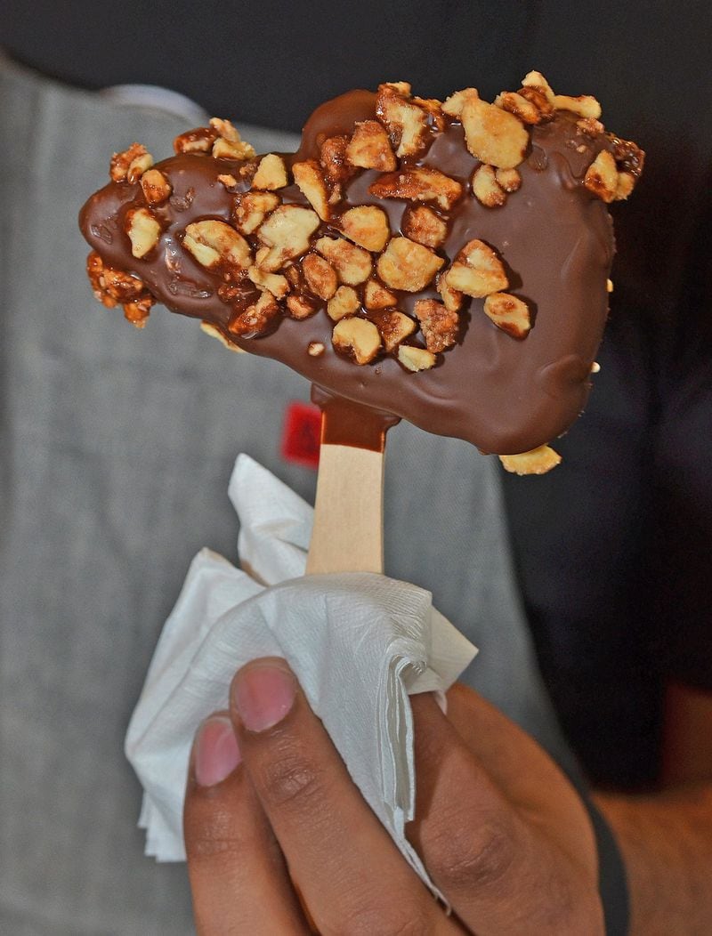 Of course, a chocolate-covered ice cream tomahawk covered in nuts will be available at SunTrust Park. The ice cream treats, designed by High Road Craft Creamery, will be available at carts throughout the stadium. CHRIS HUNT / SPECIAL