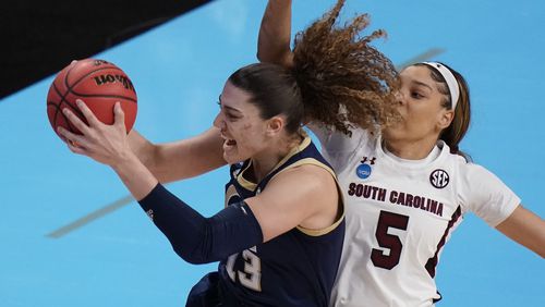 Georgia Tech forward Lorela Cubaj (13) grabs a rebound in front of South Carolina forward Victaria Saxton (5) during the first half of the Sweet Sixteen round of the women's NCAA Tournament Sunday, March 28, 2021, at the Alamodome in San Antonio. (Eric Gay/AP)