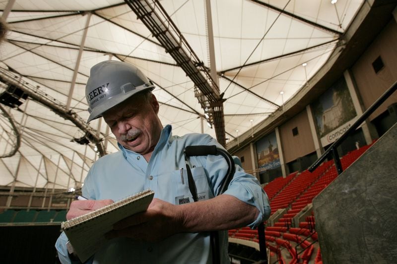 Architect George Taft in the Georgia Dome in 2008.  He was called back to work on the Dome that he helped build the day after he retired because a tornado hit the building and damaged the roof.
Louie Favorite / AJC
