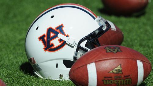 A helmet and footballs of the Auburn Tigers are on the field before play against the Chattanooga Mocs November 6, 2010 at Jordan-Hare Stadium in Auburn, Alabama.  (Photo by Al Messerschmidt/Getty Images)