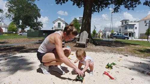 Spenser Hewett plays with her 15-month-old son Eliot in Pinewood Forest community in Fayetteville on Saturday, June 22, 2019. Spenser and Cory Hewett are millennials who have left their life in Buckhead for Fayette County, metro Atlanta’s oldest county by age. HYOSUB SHIN / HSHIN@AJC.COM