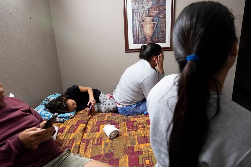 An extended migrant family of seven from Venezuela has been living in a hotel in McDonough for nearly a week since arriving in Metro Atlanta. The family, photographed Wednesday, April 10, 2024, did not want their faces shown for fear it would hurt their asylum case.ÊÊÊ(Ben Gray / Ben@BenGray.com)