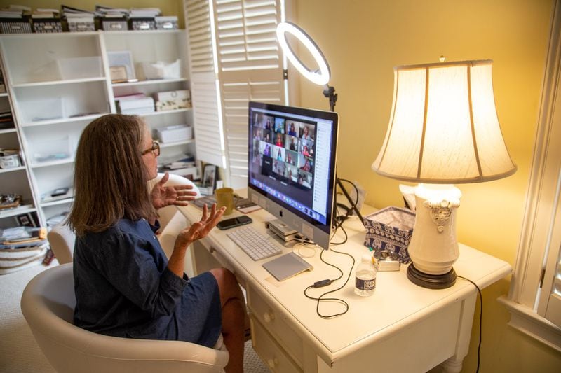 Nancy McGuirk talks with the leaders of her women's Bible study class during a Zoom call at her Atlanta home Monday, March 15, 2021. (Steve Schaefer for The Atlanta Journal-Constitution)