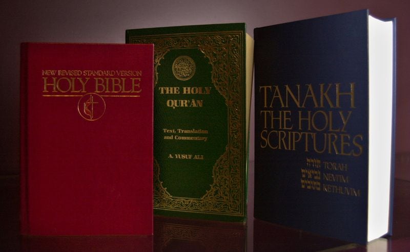 011115 - DECATUR, GA -- The Holy Bible (left), the Holy Qur'an (center) and Tanakh the Holy Scriptures. Books are Courtesy of Pitts Theology Library of Emory University. File photos