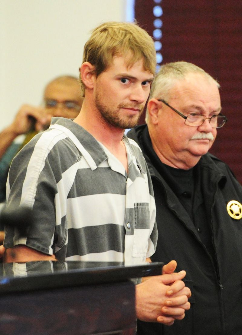 Ronnie Adrian “Jay” Towns was arraigned Tuesday on charges of malice murder and armed robbery. Police say he lured the Runions to Telfair County to buy a ‘66 Ford Mustang that didn’t exist, then shot each of them in the head. (AP Photo/The Telegraph, Woody Marshall)