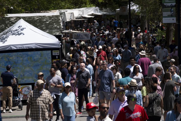 People attend the Dogwood Festival in Piedmont Park on Saturday, April 13, 2024.   (Ben Gray / Ben@BenGray.com)