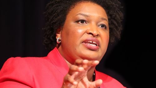 Democrat Stacey Abrams answers a debate question during a forum. Curtis Compton/ccompton@ajc.com