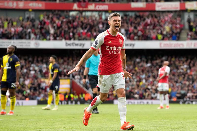 Arsenal's Leandro Trossard celebrates after scoring his side's second goal during the English Premier League soccer match between Arsenal and Bournemouth at Emirates Stadium in London, England, Saturday, May 4, 2024. (AP Photo/Frank Augstein)
