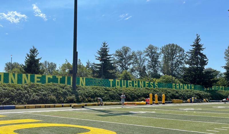 First-year Oregon coach Dan Lanning had the words 'connection, toughness, growth and sacrifice' added to a wall next to the Ducks' practice fields last week. He calls them the team's DNA principles. (Photo by Chip Towers/ctowers@ajc.com)