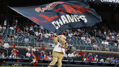 Braves mascot, the Blooper, waves the National East Champions flag prior the game between Atlanta Braves and Philadelphia Phillies at Truist Park on Monday, Sept. 18, 2023, in Atlanta. Miguel Martinez / miguel.martinezjimenez@ajc.com 