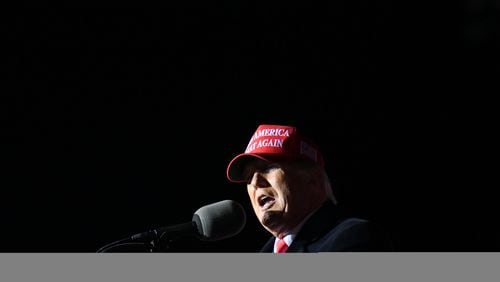 March 26, 2022 Commerce - Former former President Donald Trump speaks during a rally for Georgia GOP candidates at Banks County Dragway in Commerce on Saturday, March 26, 2022. (Hyosub Shin / Hyosub.Shin@ajc.com)