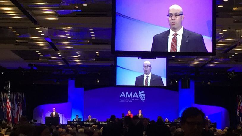 The outgoing president of the American Medical Association, Dr. Steven Stack, speaks during the organization’s 2016 annual meeting in Chicago.