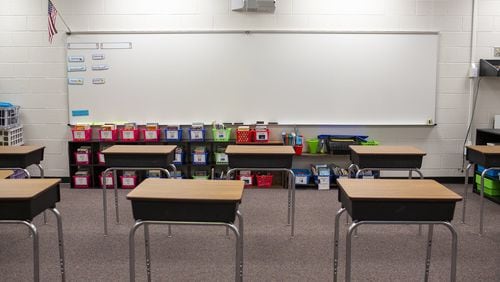 Desks are seen socially distanced in Northbrook Middle School in Suwanee on Wednesday, July 8, 2020. Many metro Atlanta districts have since opted to go online-only this fall. REBECCA WRIGHT FOR THE ATLANTA JOURNAL-CONSTITUTION